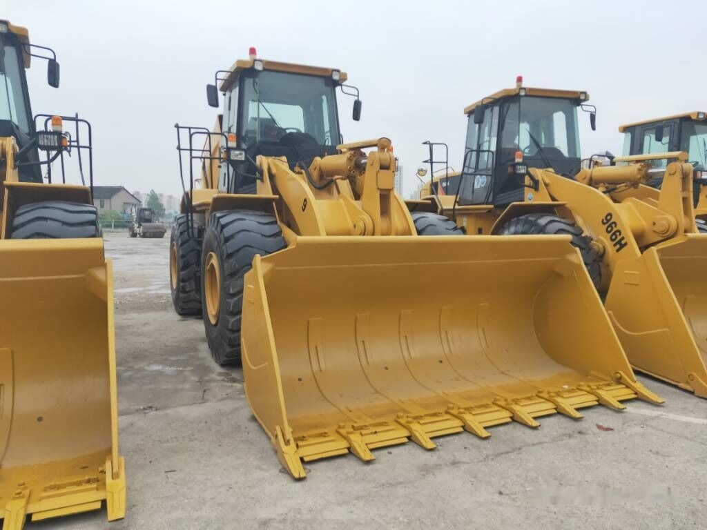 Caterpillar 966H - Utovarivač na kotačima: slika Caterpillar 966H - Utovarivač na kotačima Caterpillar 966H - Utovarivač na kotačima: slika Caterpillar 966H - Utovarivač na kotačima