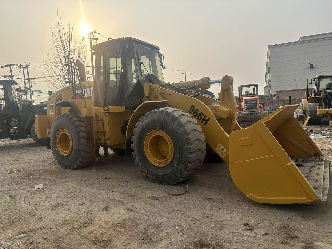 Caterpillar 966H - Utovarivač na kotačima: slika Caterpillar 966H - Utovarivač na kotačima Caterpillar 966H - Utovarivač na kotačima: slika Caterpillar 966H - Utovarivač na kotačima