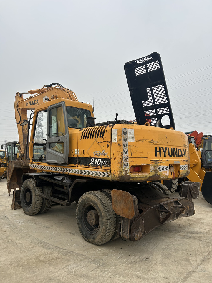 HYUNDAI R210W - Bager: slika HYUNDAI R210W - Bager HYUNDAI R210W - Bager: slika HYUNDAI R210W - Bager