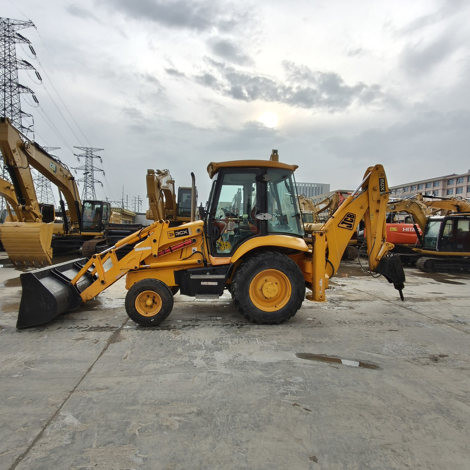 JCB 3CX - Rovokopač-utovarivač: slika JCB 3CX - Rovokopač-utovarivač JCB 3CX - Rovokopač-utovarivač: slika JCB 3CX - Rovokopač-utovarivač