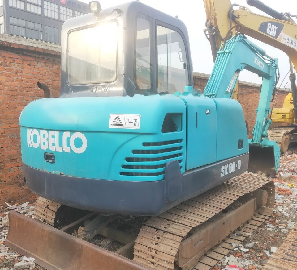 Kobelco SK60 with Swing Boom - Mini bager: slika Kobelco SK60 with Swing Boom - Mini bager Kobelco SK60 with Swing Boom - Mini bager: slika Kobelco SK60 with Swing Boom - Mini bager
