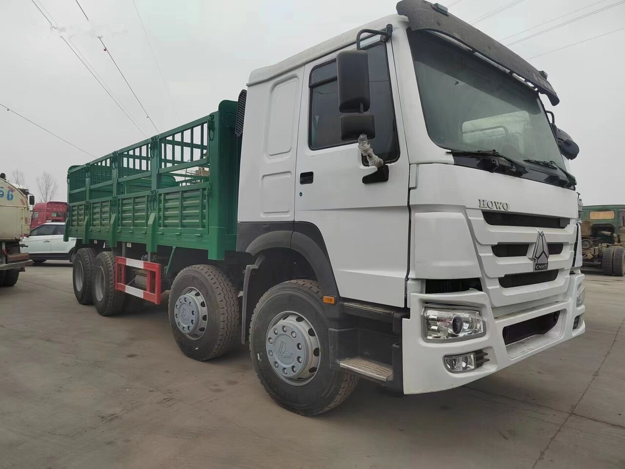 Sinotruk HOWO 8*4 Fence Truck - Kamion s otvorenim sandukom: slika Sinotruk HOWO 8*4 Fence Truck - Kamion s otvorenim sandukom Sinotruk HOWO 8*4 Fence Truck - Kamion s otvorenim sandukom: slika Sinotruk HOWO 8*4 Fence Truck - Kamion s otvorenim sandukom