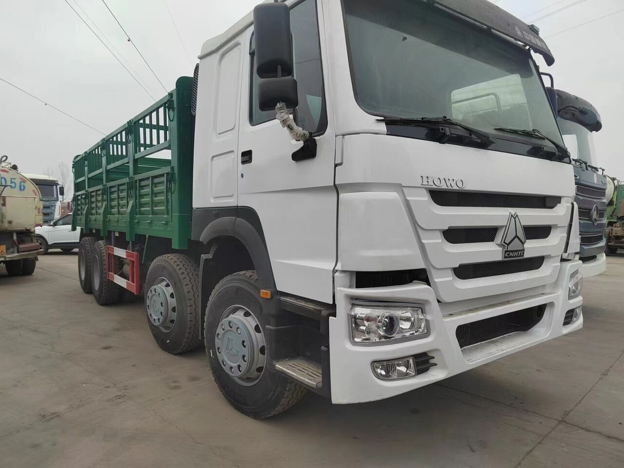 Sinotruk HOWO 8*4 Fence Truck - Kamion s otvorenim sandukom: slika Sinotruk HOWO 8*4 Fence Truck - Kamion s otvorenim sandukom Sinotruk HOWO 8*4 Fence Truck - Kamion s otvorenim sandukom: slika Sinotruk HOWO 8*4 Fence Truck - Kamion s otvorenim sandukom