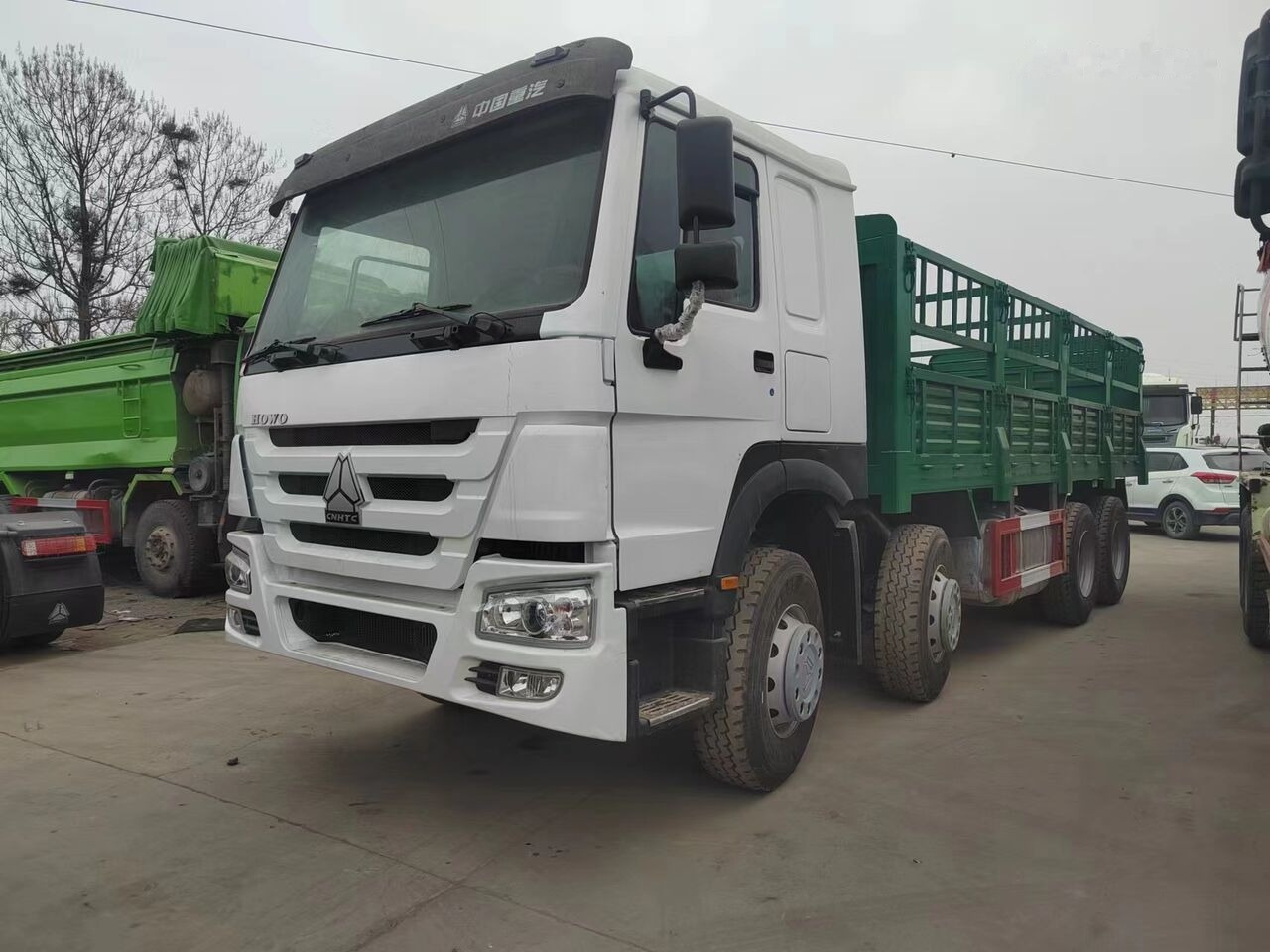 Sinotruk HOWO 8*4 Fence Truck - Kamion s otvorenim sandukom: slika Sinotruk HOWO 8*4 Fence Truck - Kamion s otvorenim sandukom Sinotruk HOWO 8*4 Fence Truck - Kamion s otvorenim sandukom: slika Sinotruk HOWO 8*4 Fence Truck - Kamion s otvorenim sandukom