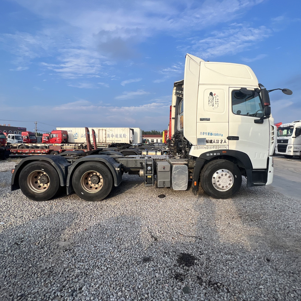 Sinotruk HOWO T7H480 Tractor - Mini istovarivač: slika Sinotruk HOWO T7H480 Tractor - Mini istovarivač Sinotruk HOWO T7H480 Tractor - Mini istovarivač: slika Sinotruk HOWO T7H480 Tractor - Mini istovarivač