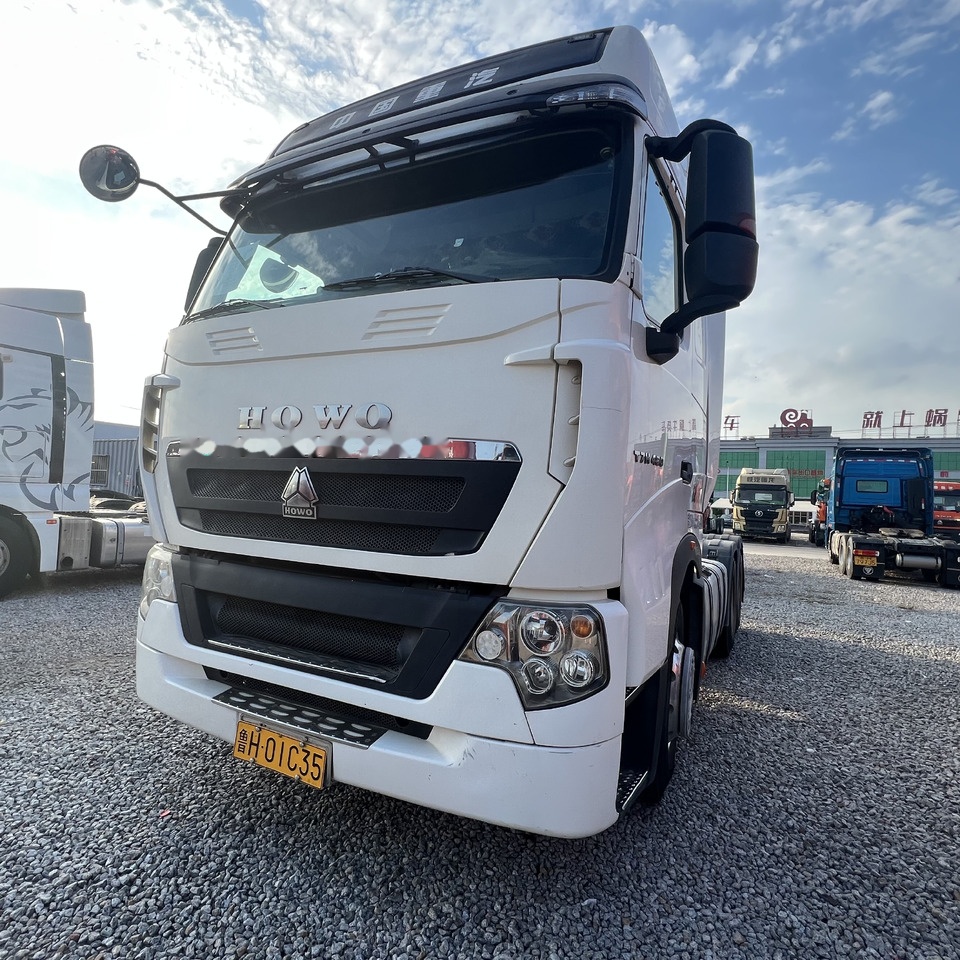 Sinotruk HOWO T7H480 - Tegljač: slika Sinotruk HOWO T7H480 - Tegljač Sinotruk HOWO T7H480 - Tegljač: slika Sinotruk HOWO T7H480 - Tegljač