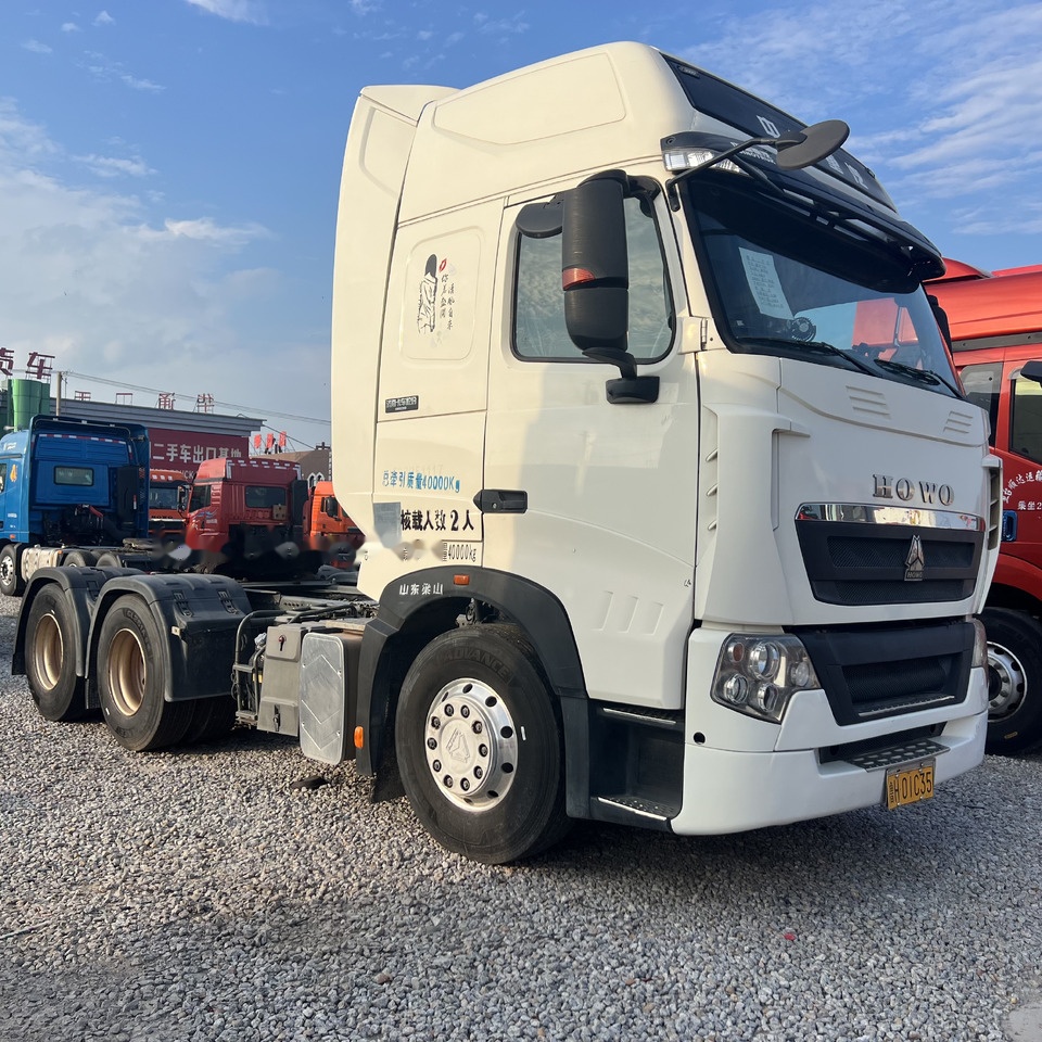 Sinotruk HOWO T7H480 - Tegljač: slika Sinotruk HOWO T7H480 - Tegljač Sinotruk HOWO T7H480 - Tegljač: slika Sinotruk HOWO T7H480 - Tegljač