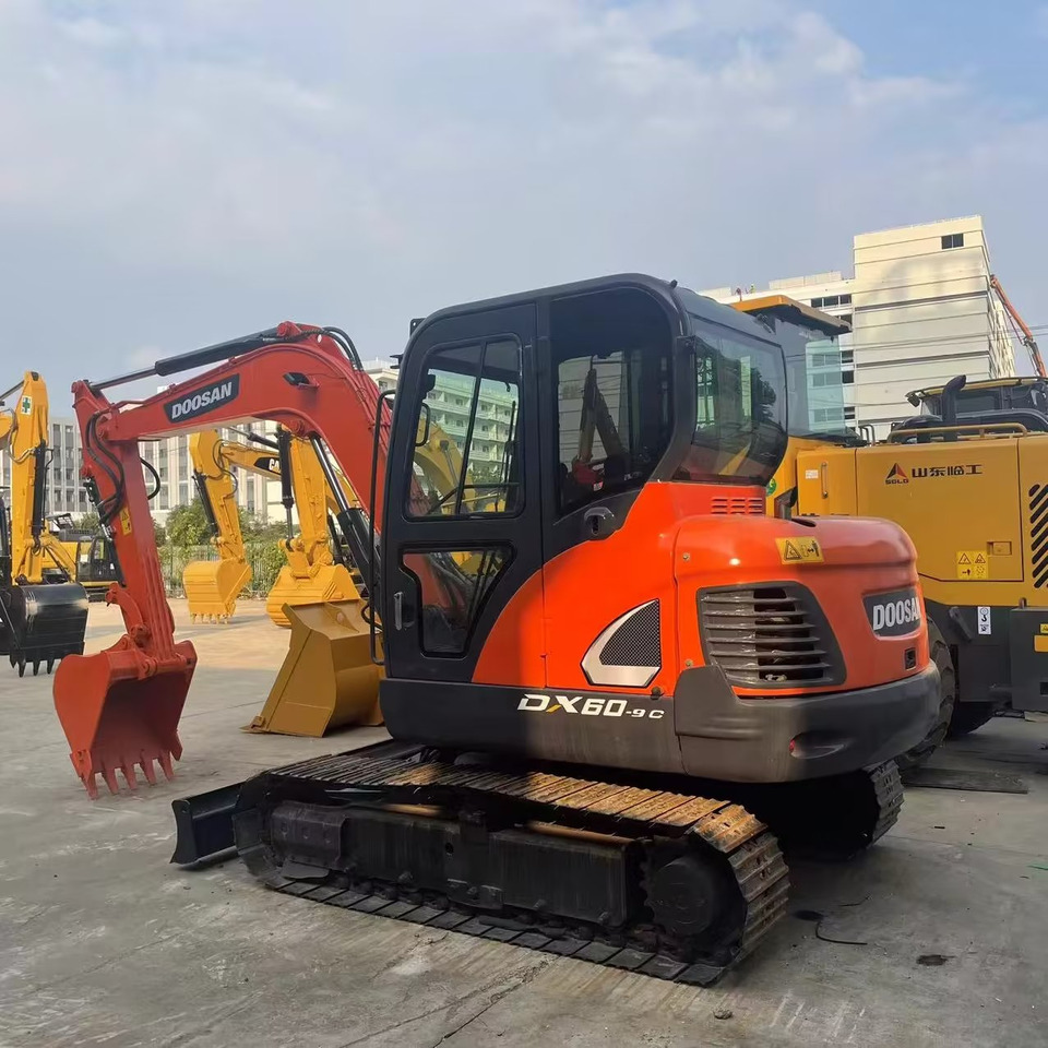 DOOSAN DX 60 - 9 C Doosan DX60-9C - Mini bager: slika DOOSAN DX 60 - 9 C Doosan DX60-9C - Mini bager DOOSAN DX 60 - 9 C Doosan DX60-9C - Mini bager: slika DOOSAN DX 60 - 9 C Doosan DX60-9C - Mini bager