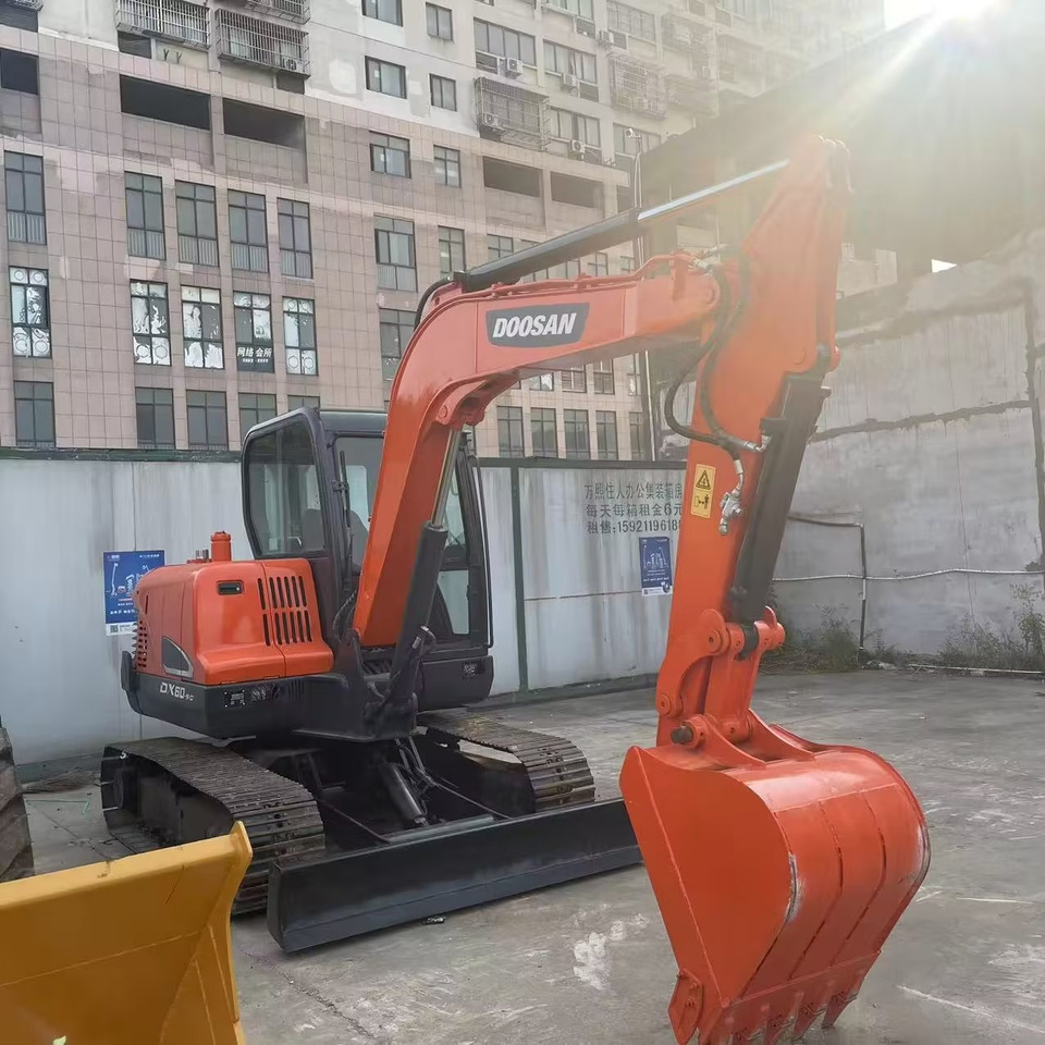 DOOSAN DX 60 - 9 C Doosan DX60-9C - Mini bager: slika DOOSAN DX 60 - 9 C Doosan DX60-9C - Mini bager DOOSAN DX 60 - 9 C Doosan DX60-9C - Mini bager: slika DOOSAN DX 60 - 9 C Doosan DX60-9C - Mini bager