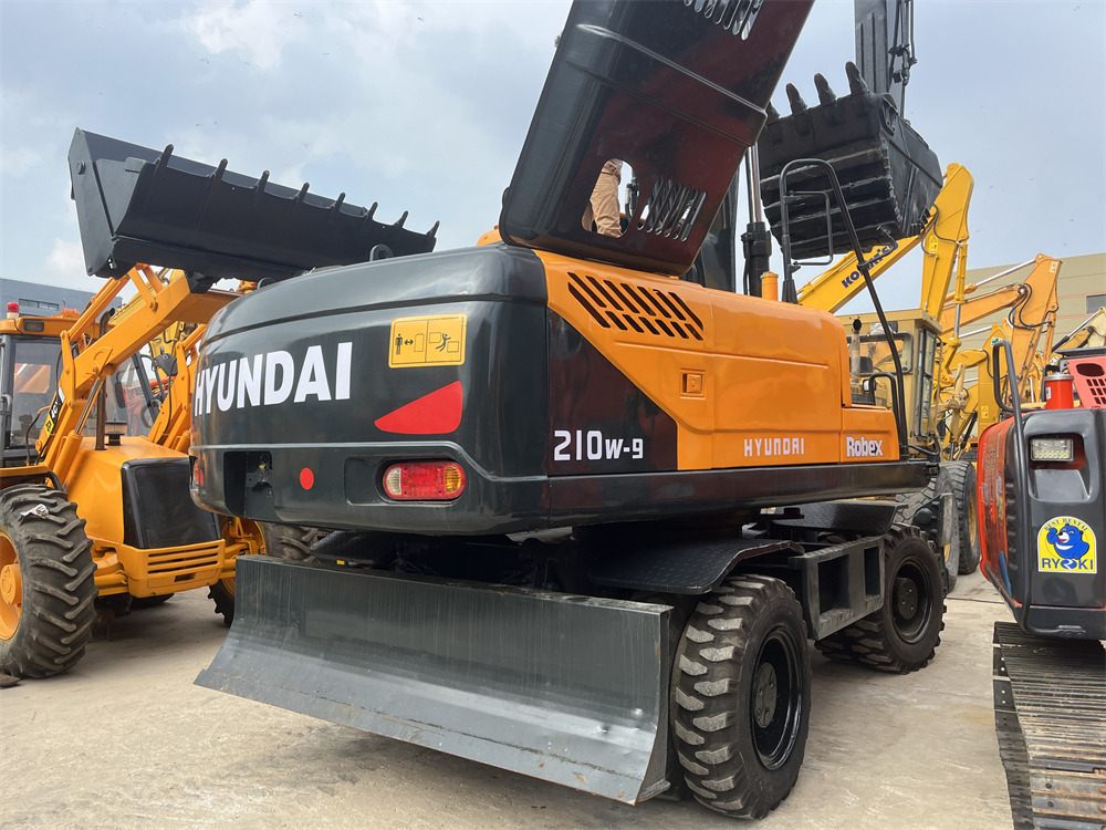 HYUNDAI 210W-9 - Bager na kotačima: slika HYUNDAI 210W-9 - Bager na kotačima HYUNDAI 210W-9 - Bager na kotačima: slika HYUNDAI 210W-9 - Bager na kotačima