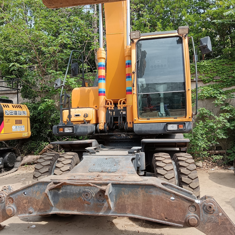 HYUNDAI 210W-9 T - Bager na kotačima: slika HYUNDAI 210W-9 T - Bager na kotačima HYUNDAI 210W-9 T - Bager na kotačima: slika HYUNDAI 210W-9 T - Bager na kotačima