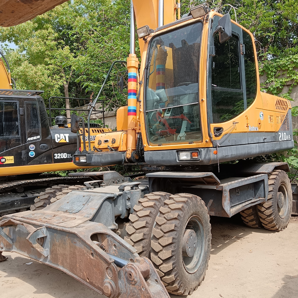 HYUNDAI 210W-9 T - Bager na kotačima: slika HYUNDAI 210W-9 T - Bager na kotačima HYUNDAI 210W-9 T - Bager na kotačima: slika HYUNDAI 210W-9 T - Bager na kotačima