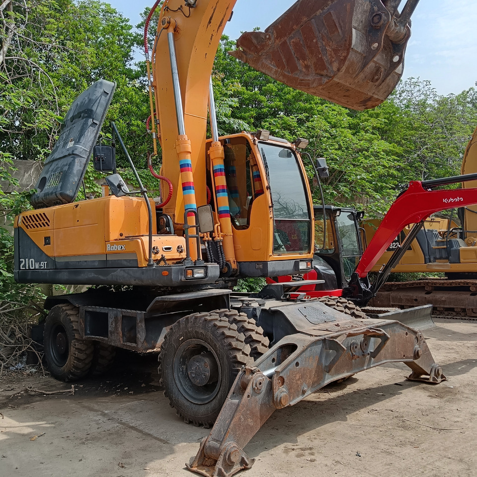 HYUNDAI 210W-9 T - Bager na kotačima: slika HYUNDAI 210W-9 T - Bager na kotačima HYUNDAI 210W-9 T - Bager na kotačima: slika HYUNDAI 210W-9 T - Bager na kotačima