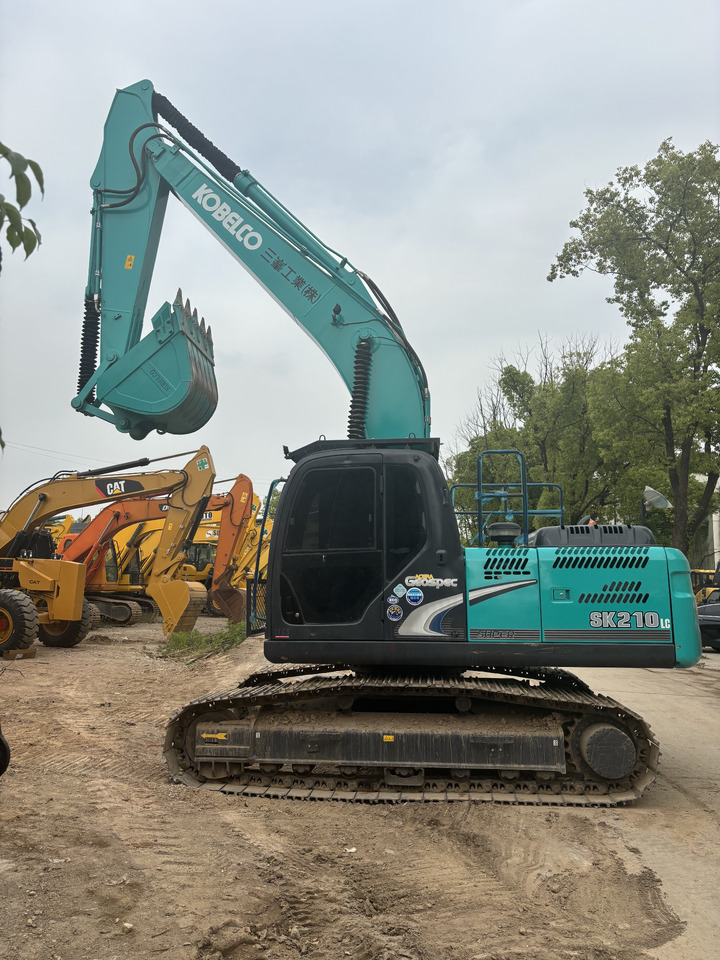 KOBELCO SK210LC - Bager gusjeničar: slika KOBELCO SK210LC - Bager gusjeničar KOBELCO SK210LC - Bager gusjeničar: slika KOBELCO SK210LC - Bager gusjeničar