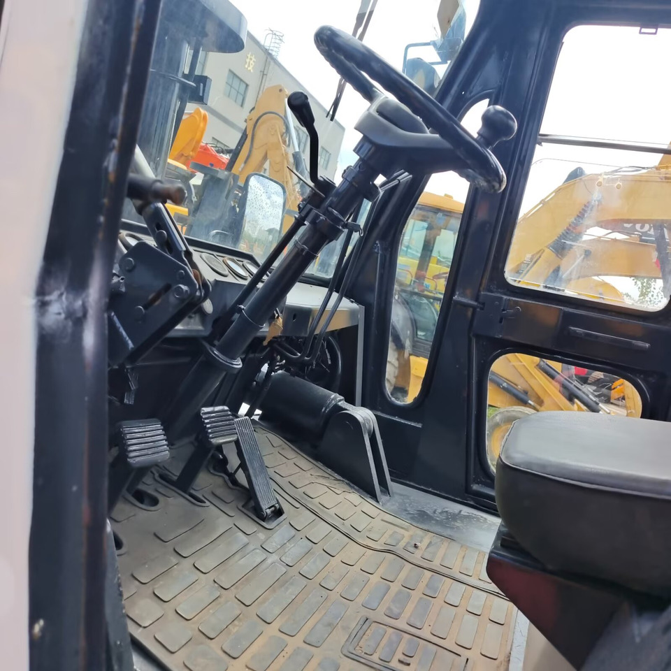 TCM FD 100 - Viličar: slika TCM FD 100 - Viličar TCM FD 100 - Viličar: slika TCM FD 100 - Viličar