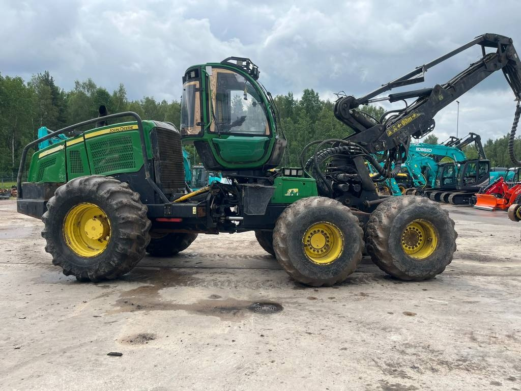 John Deere 1470 E - Kombajn za šumarstvo: slika John Deere 1470 E - Kombajn za šumarstvo John Deere 1470 E - Kombajn za šumarstvo: slika John Deere 1470 E - Kombajn za šumarstvo