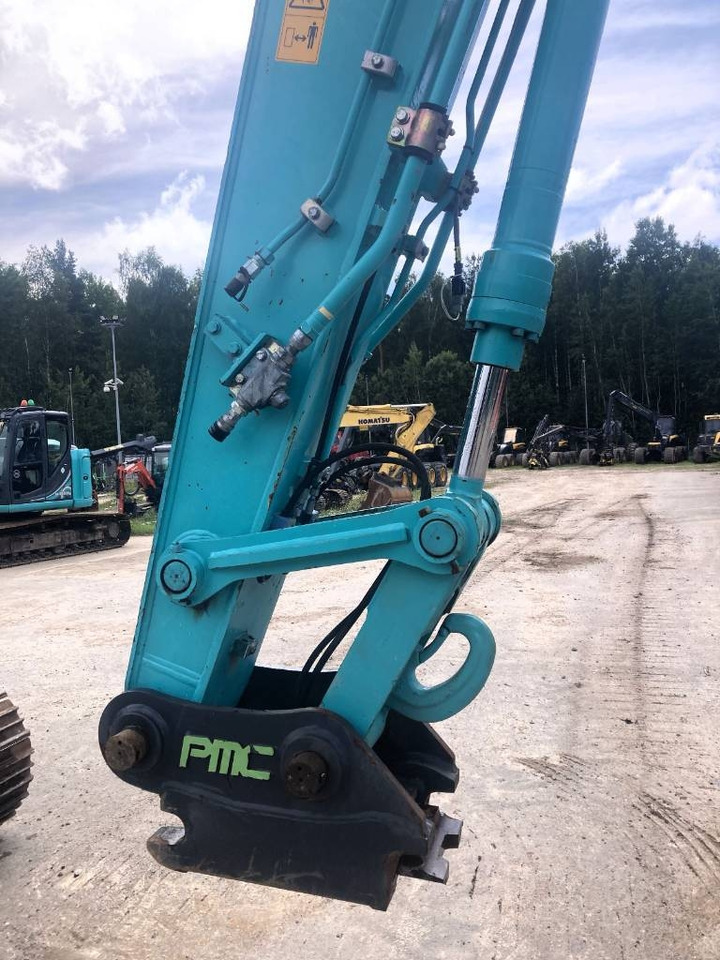 Kobelco SK 140 SRLC-5 - Bager gusjeničar: slika Kobelco SK 140 SRLC-5 - Bager gusjeničar Kobelco SK 140 SRLC-5 - Bager gusjeničar: slika Kobelco SK 140 SRLC-5 - Bager gusjeničar