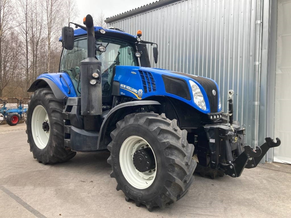 New Holland T 8.320 AC - Traktor: slika New Holland T 8.320 AC - Traktor New Holland T 8.320 AC - Traktor: slika New Holland T 8.320 AC - Traktor
