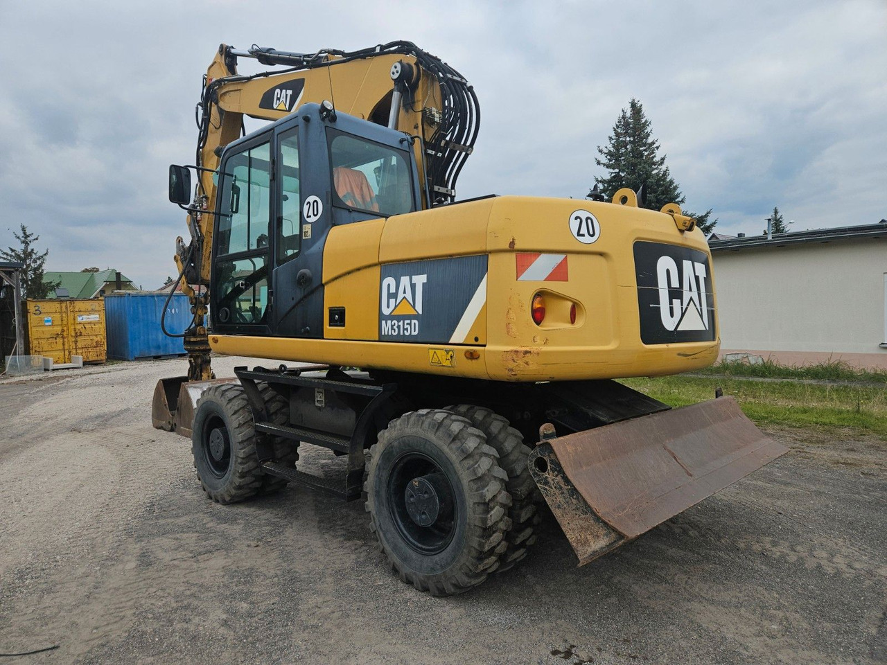 CAT M315D orig. 4.129h - Bager na kotačima: slika CAT M315D orig. 4.129h - Bager na kotačima CAT M315D orig. 4.129h - Bager na kotačima: slika CAT M315D orig. 4.129h - Bager na kotačima