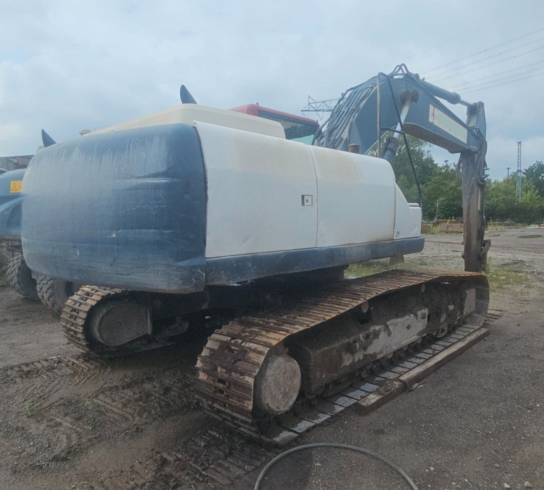 Case CX 240B Kettenbagger - Bager gusjeničar: slika Case CX 240B Kettenbagger - Bager gusjeničar Case CX 240B Kettenbagger - Bager gusjeničar: slika Case CX 240B Kettenbagger - Bager gusjeničar