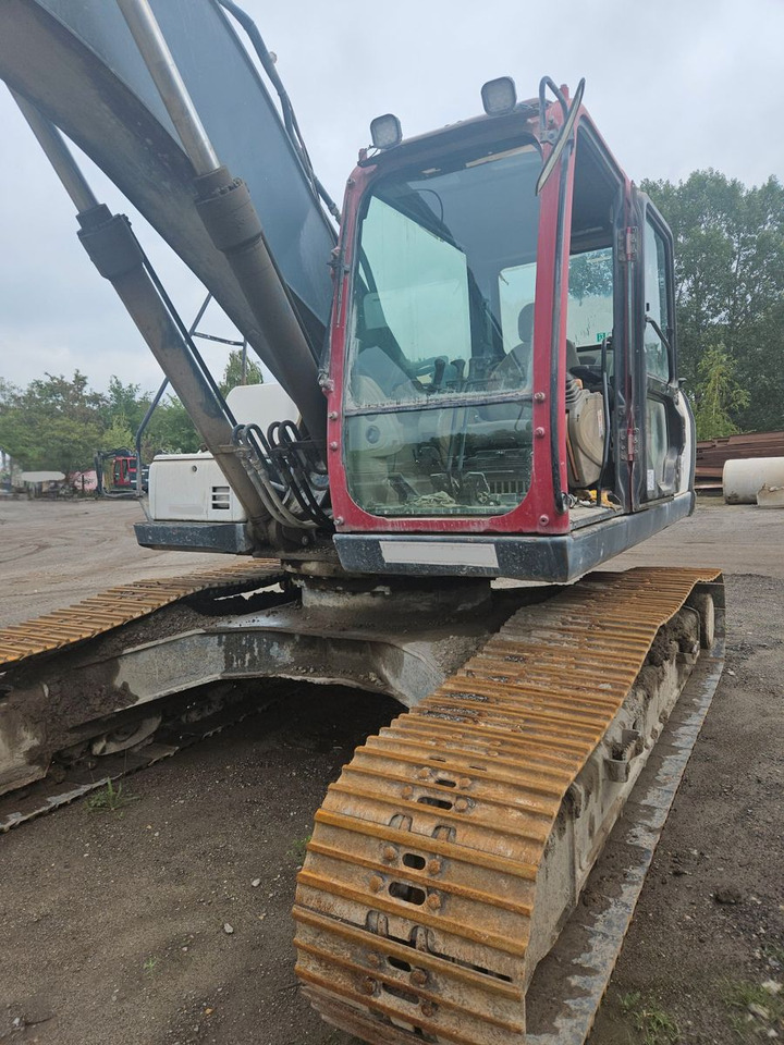 Case CX 240B Kettenbagger - Bager gusjeničar: slika Case CX 240B Kettenbagger - Bager gusjeničar Case CX 240B Kettenbagger - Bager gusjeničar: slika Case CX 240B Kettenbagger - Bager gusjeničar