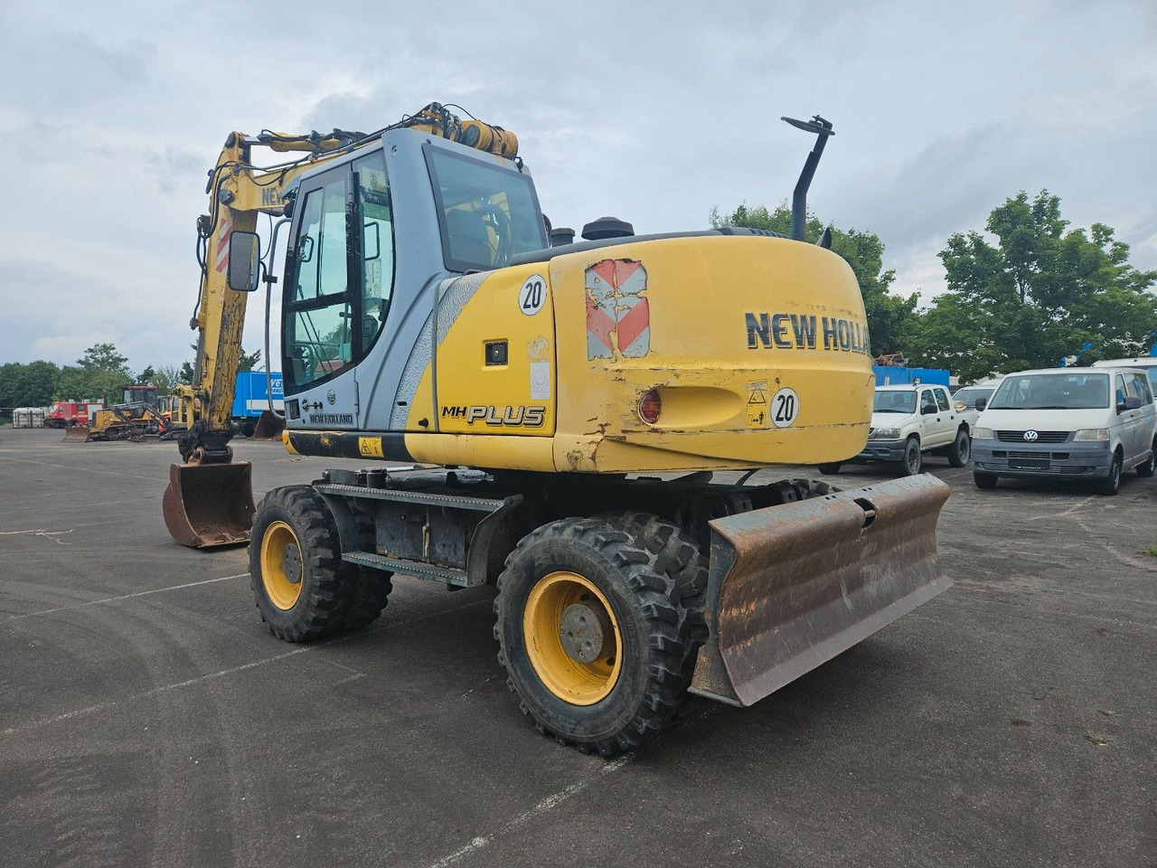 New Holland MH Plus 18t Mobilbagger - Bager na kotačima: slika New Holland MH Plus 18t Mobilbagger - Bager na kotačima New Holland MH Plus 18t Mobilbagger - Bager na kotačima: slika New Holland MH Plus 18t Mobilbagger - Bager na kotačima