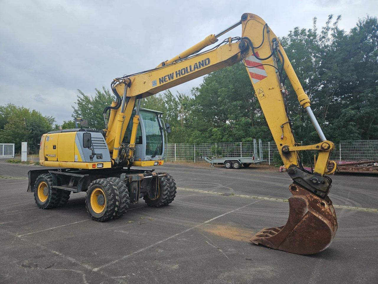 New Holland MH Plus 18t Mobilbagger - Bager na kotačima: slika New Holland MH Plus 18t Mobilbagger - Bager na kotačima New Holland MH Plus 18t Mobilbagger - Bager na kotačima: slika New Holland MH Plus 18t Mobilbagger - Bager na kotačima