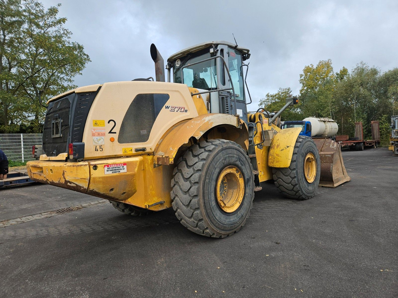 New Holland W270 B Radlader - Utovarivač na kotačima: slika New Holland W270 B Radlader - Utovarivač na kotačima New Holland W270 B Radlader - Utovarivač na kotačima: slika New Holland W270 B Radlader - Utovarivač na kotačima