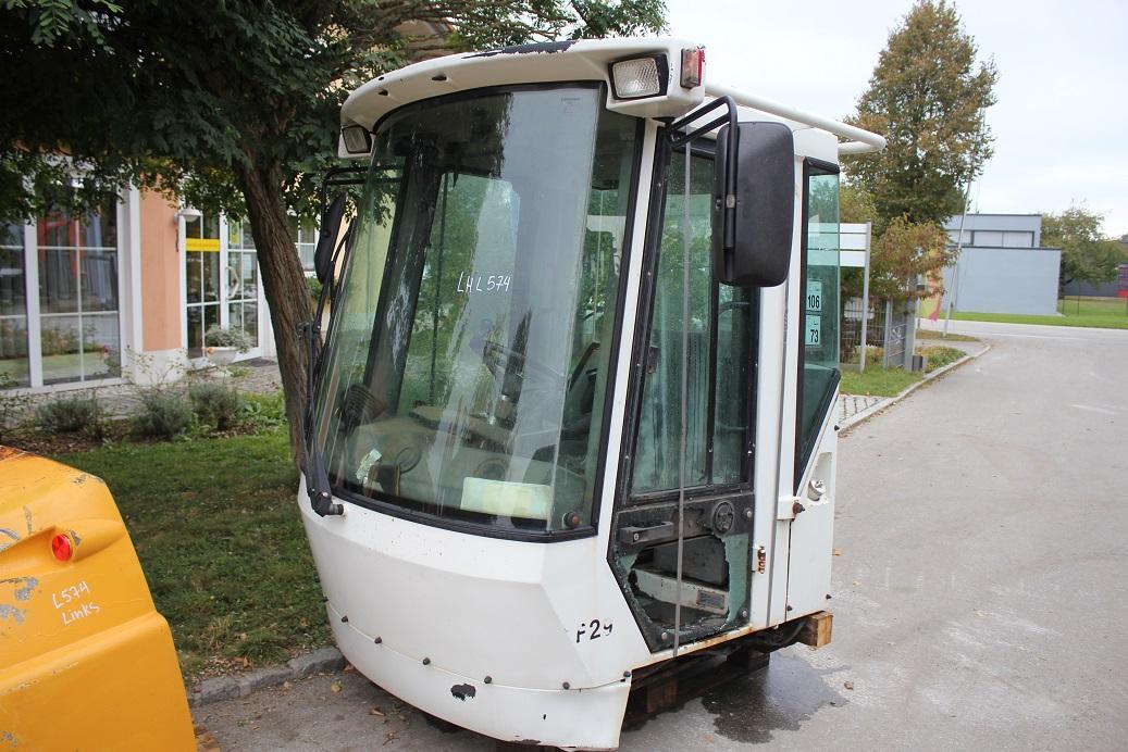 Liebherr L 574 - Kabina za Utovarivač na kotačima: slika Liebherr L 574 - Kabina za Utovarivač na kotačima Liebherr L 574 - Kabina za Utovarivač na kotačima: slika Liebherr L 574 - Kabina za Utovarivač na kotačima