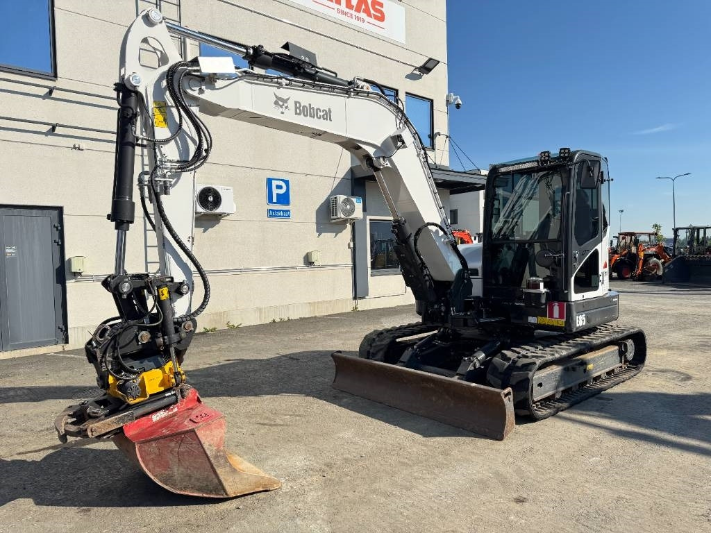 Bobcat E85 PYÖRITTÄJÄLLÄ - Mini bager: slika Bobcat E85 PYÖRITTÄJÄLLÄ - Mini bager Bobcat E85 PYÖRITTÄJÄLLÄ - Mini bager: slika Bobcat E85 PYÖRITTÄJÄLLÄ - Mini bager