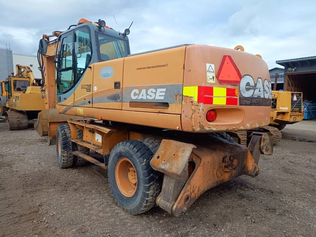 Case WX210 PYÖRITTÄJÄLLÄ  - Bager na kotačima: slika Case WX210 PYÖRITTÄJÄLLÄ  - Bager na kotačima Case WX210 PYÖRITTÄJÄLLÄ  - Bager na kotačima: slika Case WX210 PYÖRITTÄJÄLLÄ  - Bager na kotačima