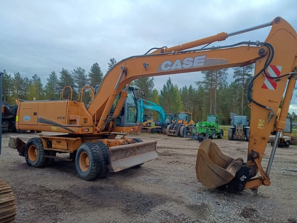 Case WX210 PYÖRITTÄJÄLLÄ  - Bager na kotačima: slika Case WX210 PYÖRITTÄJÄLLÄ  - Bager na kotačima Case WX210 PYÖRITTÄJÄLLÄ  - Bager na kotačima: slika Case WX210 PYÖRITTÄJÄLLÄ  - Bager na kotačima