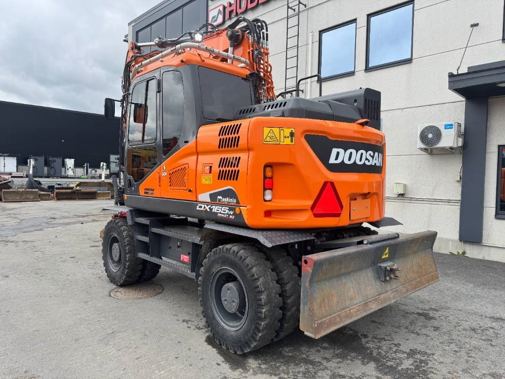 Doosan DX 165 W-5 - Bager na kotačima: slika Doosan DX 165 W-5 - Bager na kotačima Doosan DX 165 W-5 - Bager na kotačima: slika Doosan DX 165 W-5 - Bager na kotačima