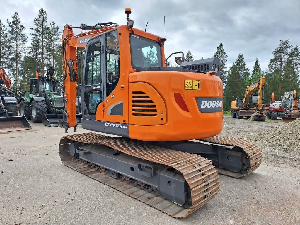 Doosan DX140LCR-5 - Bager gusjeničar: slika Doosan DX140LCR-5 - Bager gusjeničar Doosan DX140LCR-5 - Bager gusjeničar: slika Doosan DX140LCR-5 - Bager gusjeničar