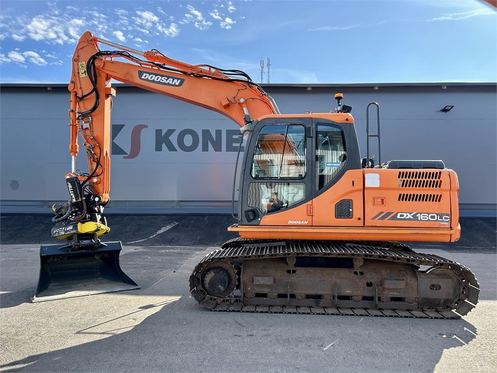 Doosan DX160LC-3 KALLISTAJA+PYÖRITTÄJÄ - Bager gusjeničar: slika Doosan DX160LC-3 KALLISTAJA+PYÖRITTÄJÄ - Bager gusjeničar Doosan DX160LC-3 KALLISTAJA+PYÖRITTÄJÄ - Bager gusjeničar: slika Doosan DX160LC-3 KALLISTAJA+PYÖRITTÄJÄ - Bager gusjeničar