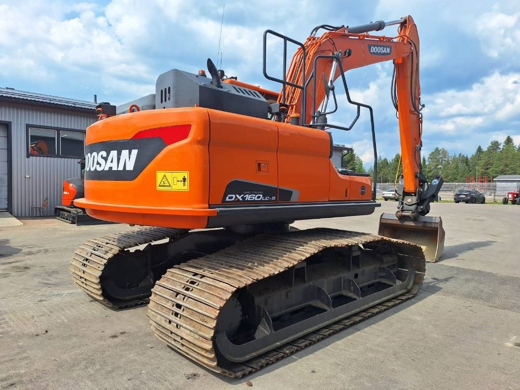 Doosan DX160LCH-5 METSÄMALLI KALLISTAJALLA - Bager gusjeničar: slika Doosan DX160LCH-5 METSÄMALLI KALLISTAJALLA - Bager gusjeničar Doosan DX160LCH-5 METSÄMALLI KALLISTAJALLA - Bager gusjeničar: slika Doosan DX160LCH-5 METSÄMALLI KALLISTAJALLA - Bager gusjeničar