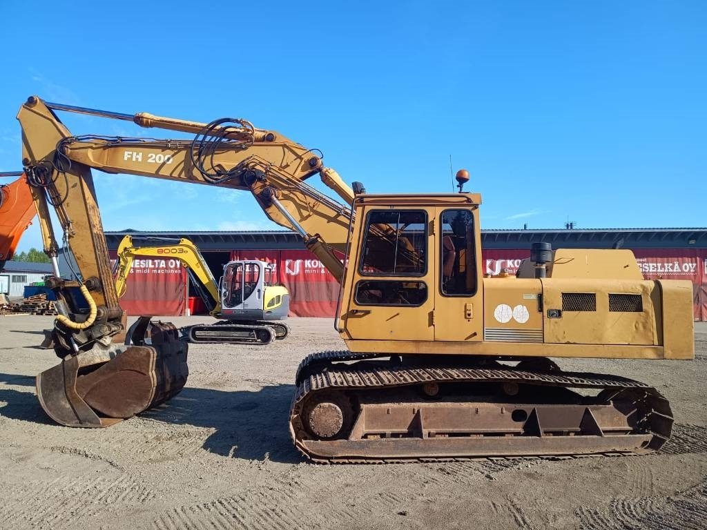 Fiat-Hitachi FH200T 2-KAUHAA - Bager gusjeničar: slika Fiat-Hitachi FH200T 2-KAUHAA - Bager gusjeničar Fiat-Hitachi FH200T 2-KAUHAA - Bager gusjeničar: slika Fiat-Hitachi FH200T 2-KAUHAA - Bager gusjeničar