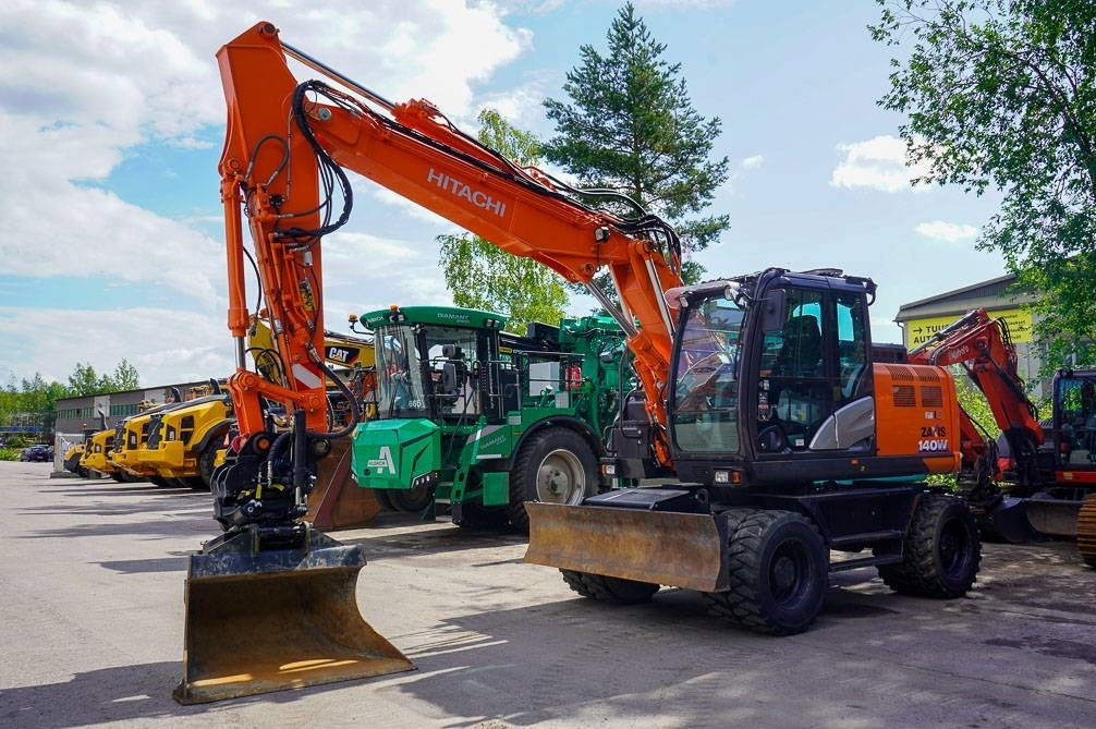 Hitachi ZX 140 W-6 - Bager na kotačima: slika Hitachi ZX 140 W-6 - Bager na kotačima Hitachi ZX 140 W-6 - Bager na kotačima: slika Hitachi ZX 140 W-6 - Bager na kotačima