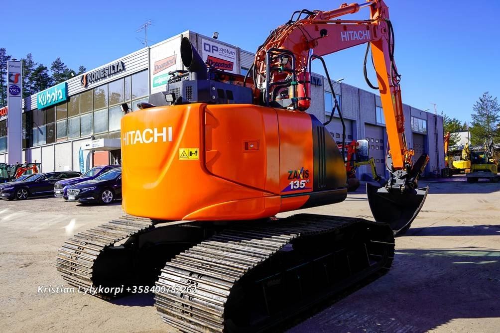 Hitachi ZX135US-6 METSÄALUSTALLA - Bager gusjeničar: slika Hitachi ZX135US-6 METSÄALUSTALLA - Bager gusjeničar Hitachi ZX135US-6 METSÄALUSTALLA - Bager gusjeničar: slika Hitachi ZX135US-6 METSÄALUSTALLA - Bager gusjeničar