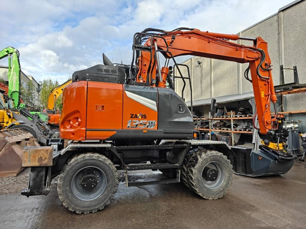 Hitachi ZX135W-7 VARUSTELTU - Bager na kotačima: slika Hitachi ZX135W-7 VARUSTELTU - Bager na kotačima Hitachi ZX135W-7 VARUSTELTU - Bager na kotačima: slika Hitachi ZX135W-7 VARUSTELTU - Bager na kotačima