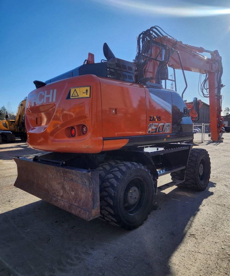 Hitachi ZX150W-7 STAGE 5 - Bager na kotačima: slika Hitachi ZX150W-7 STAGE 5 - Bager na kotačima Hitachi ZX150W-7 STAGE 5 - Bager na kotačima: slika Hitachi ZX150W-7 STAGE 5 - Bager na kotačima
