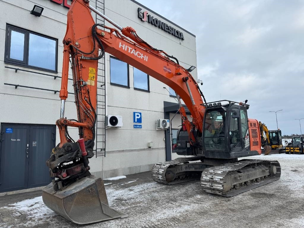 Hitachi ZX225USLC-5B PYÖRITTÄJÄLLÄ - Bager gusjeničar: slika Hitachi ZX225USLC-5B PYÖRITTÄJÄLLÄ - Bager gusjeničar Hitachi ZX225USLC-5B PYÖRITTÄJÄLLÄ - Bager gusjeničar: slika Hitachi ZX225USLC-5B PYÖRITTÄJÄLLÄ - Bager gusjeničar