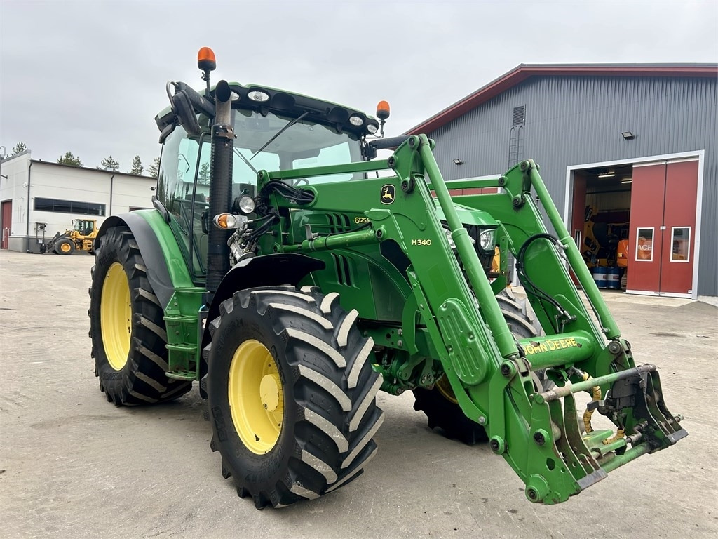 John Deere 6125 R AUTOPOWER ETUKUORMAAJALLA - Traktor: slika John Deere 6125 R AUTOPOWER ETUKUORMAAJALLA - Traktor John Deere 6125 R AUTOPOWER ETUKUORMAAJALLA - Traktor: slika John Deere 6125 R AUTOPOWER ETUKUORMAAJALLA - Traktor
