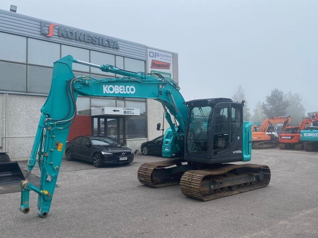 Kobelco SK140SRLC-7 - Bager gusjeničar: slika Kobelco SK140SRLC-7 - Bager gusjeničar Kobelco SK140SRLC-7 - Bager gusjeničar: slika Kobelco SK140SRLC-7 - Bager gusjeničar
