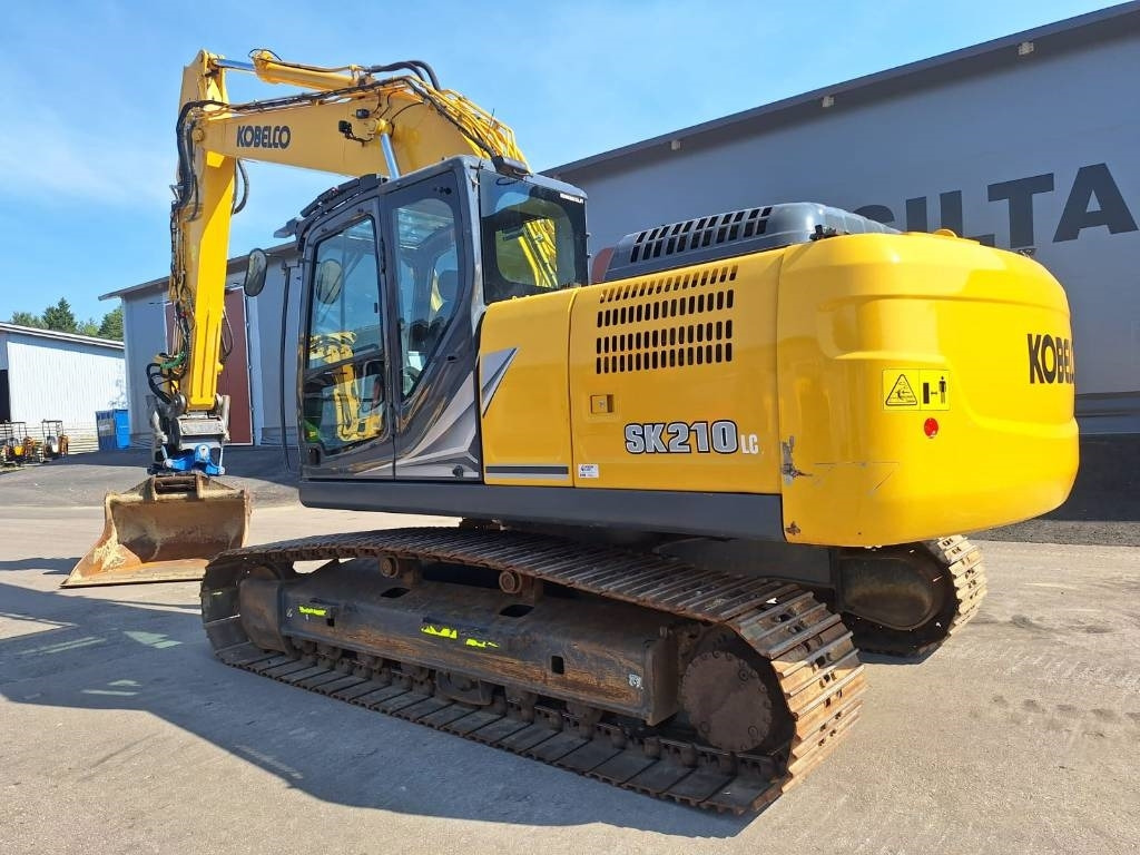 Kobelco SK210LC-11 PYÖRITTÄJÄLLÄ - Bager gusjeničar: slika Kobelco SK210LC-11 PYÖRITTÄJÄLLÄ - Bager gusjeničar Kobelco SK210LC-11 PYÖRITTÄJÄLLÄ - Bager gusjeničar: slika Kobelco SK210LC-11 PYÖRITTÄJÄLLÄ - Bager gusjeničar
