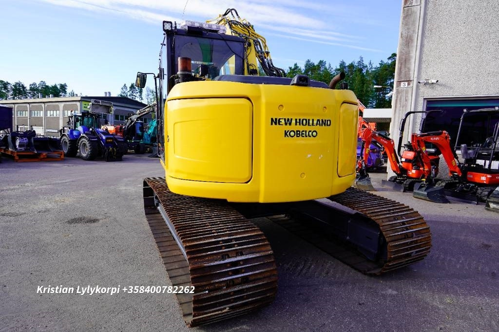 New Holland E140CSR ENGCONILLA - Bager gusjeničar: slika New Holland E140CSR ENGCONILLA - Bager gusjeničar New Holland E140CSR ENGCONILLA - Bager gusjeničar: slika New Holland E140CSR ENGCONILLA - Bager gusjeničar