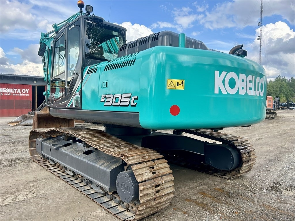 New Holland Kobelco E305C EVO - Bager gusjeničar: slika New Holland Kobelco E305C EVO - Bager gusjeničar New Holland Kobelco E305C EVO - Bager gusjeničar: slika New Holland Kobelco E305C EVO - Bager gusjeničar