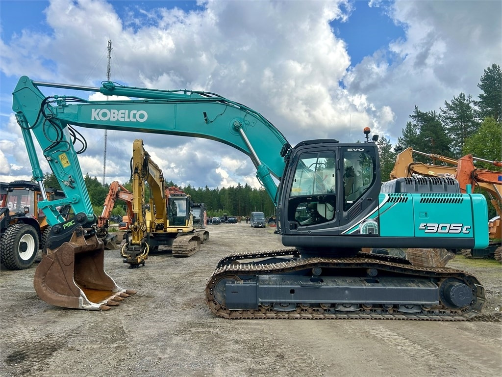 New Holland Kobelco E305C EVO - Bager gusjeničar: slika New Holland Kobelco E305C EVO - Bager gusjeničar New Holland Kobelco E305C EVO - Bager gusjeničar: slika New Holland Kobelco E305C EVO - Bager gusjeničar
