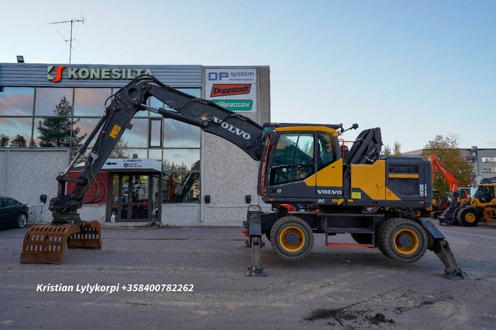 Volvo EW 200 E MH - Stroj za rukovanje otpadom: slika Volvo EW 200 E MH - Stroj za rukovanje otpadom Volvo EW 200 E MH - Stroj za rukovanje otpadom: slika Volvo EW 200 E MH - Stroj za rukovanje otpadom