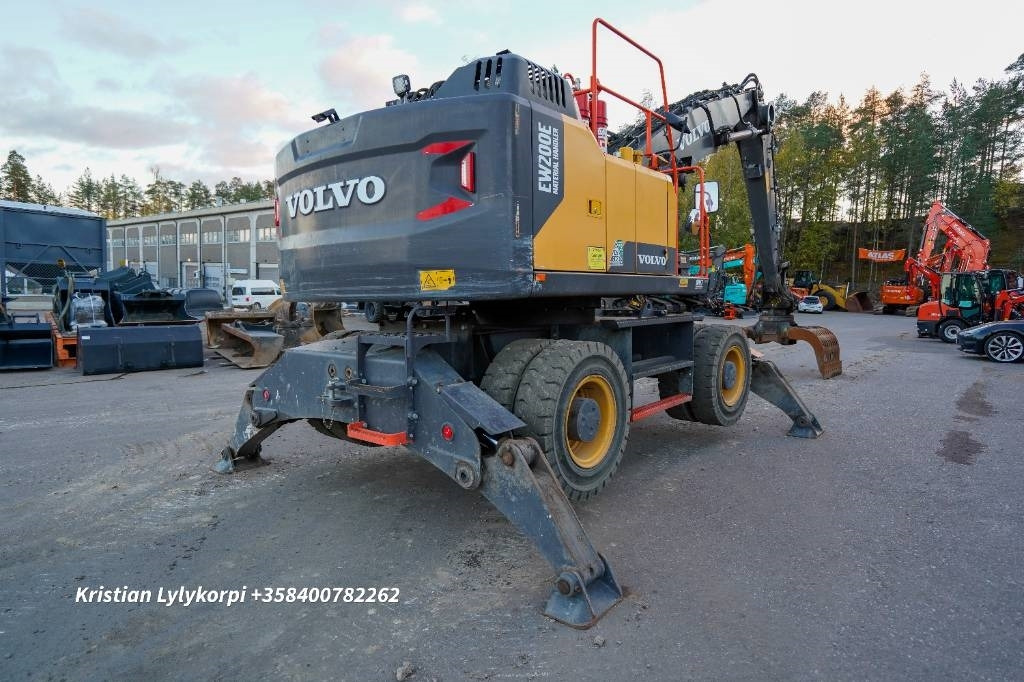 Volvo EW 200 E MH - Stroj za rukovanje otpadom: slika Volvo EW 200 E MH - Stroj za rukovanje otpadom Volvo EW 200 E MH - Stroj za rukovanje otpadom: slika Volvo EW 200 E MH - Stroj za rukovanje otpadom